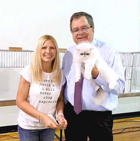 Cat show with judge